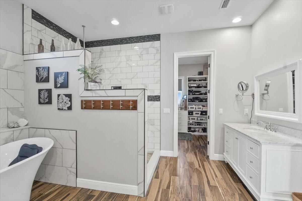 Bathroom, Free Standing Baths, Interior, Recessed Lighting, Walk-in Closets, Wood Texture Flooring