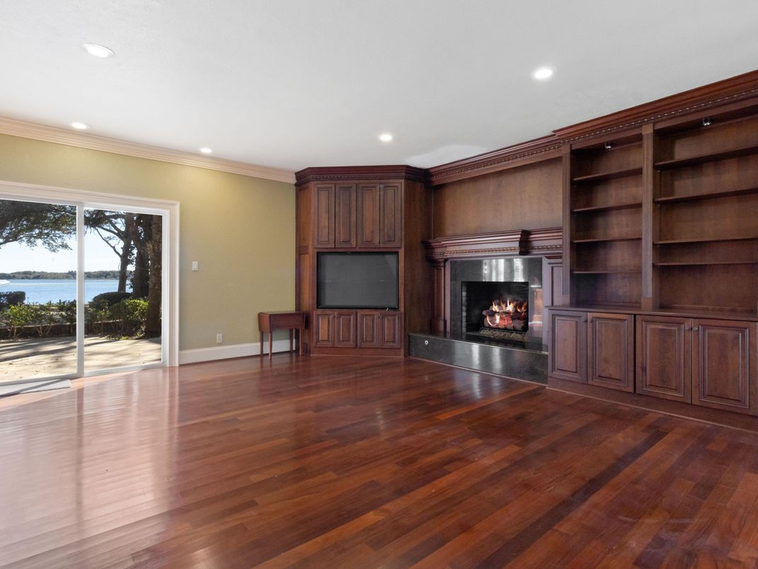 Empty room, Fireplace, Interior, Recessed Lighting, Water, Wood Texture Flooring
