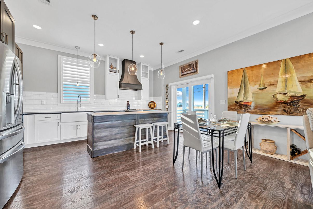 Dining room, Interior, Kitchen, Pendant Lights, Recessed Lighting, Stainless Steel Appliances, Wood Texture Flooring