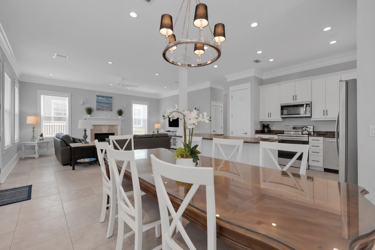 Chandelier, Dining room, Fireplace, Interior, Kitchen, Living room, Pendant Lights, Recessed Lighting, Stainless Steel Appliances