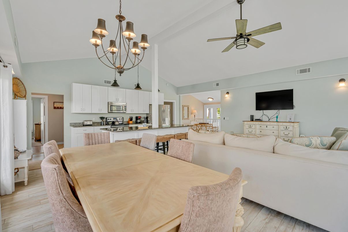 Chandelier, Dining room, Interior, Kitchen, Living room, Stainless Steel Appliances, Wood Texture Flooring