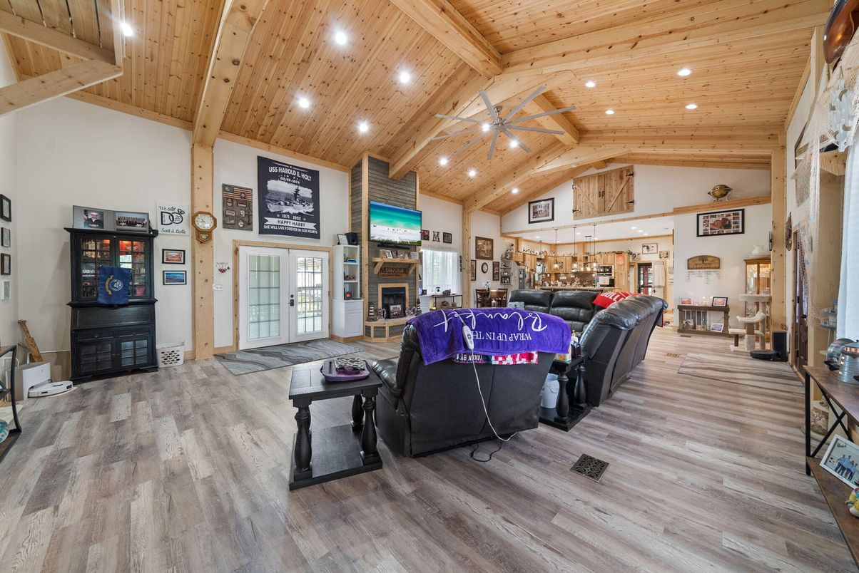 Fireplace, Interior, Living room, Pendant Lights, Recessed Lighting, Wooden Beams, Wooden Ceilings, Wood Texture Flooring