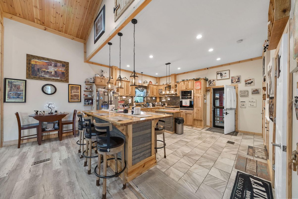 Dining room, Interior, Kitchen, Pendant Lights, Recessed Lighting, Stainless Steel Appliances, Wooden Ceilings