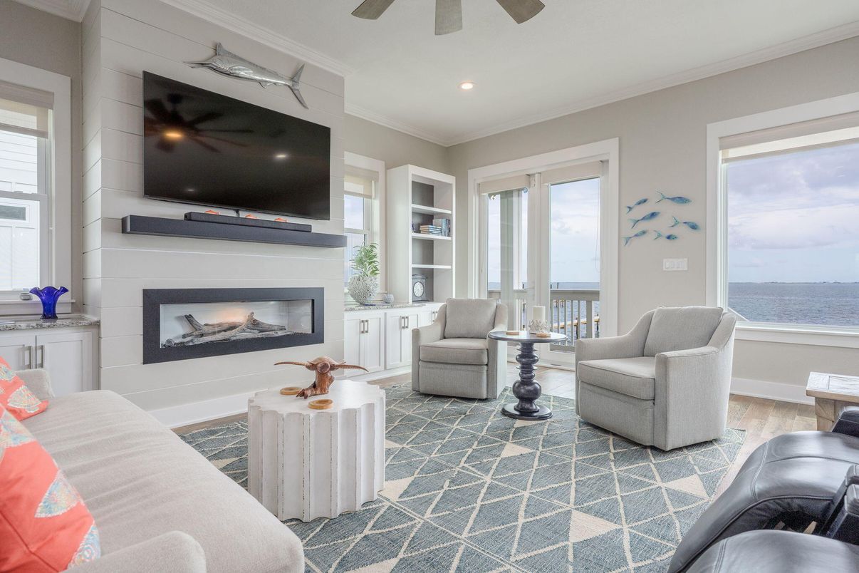 Fireplace, Interior, Living room, Recessed Lighting, Water, Wood Texture Flooring