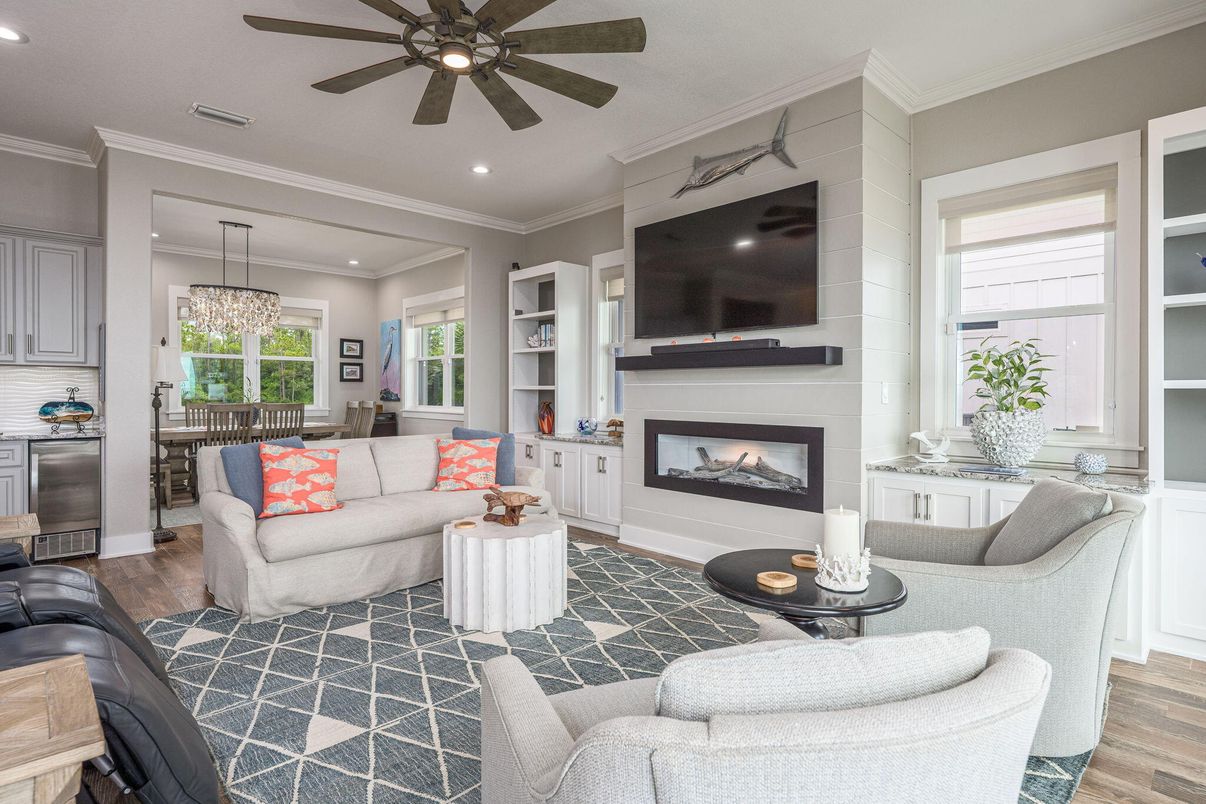 Chandelier, Dining room, Fireplace, Interior, Living room, Pendant Lights, Recessed Lighting, Wood Texture Flooring