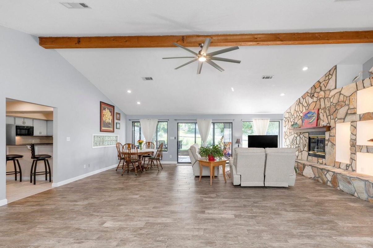 Dining room, Fireplace, Interior, Kitchen, Living room, Recessed Lighting, Stone Walls, Wooden Beams, Wood Texture Flooring