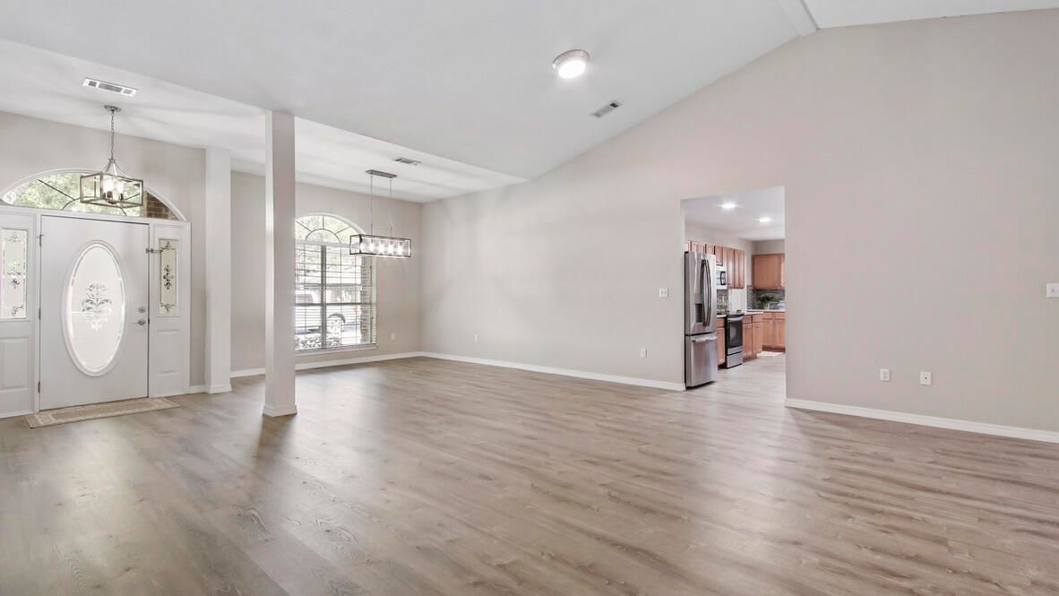 Empty room, Interior, Kitchen, Pendant Lights, Recessed Lighting, Washer, Wood Texture Flooring