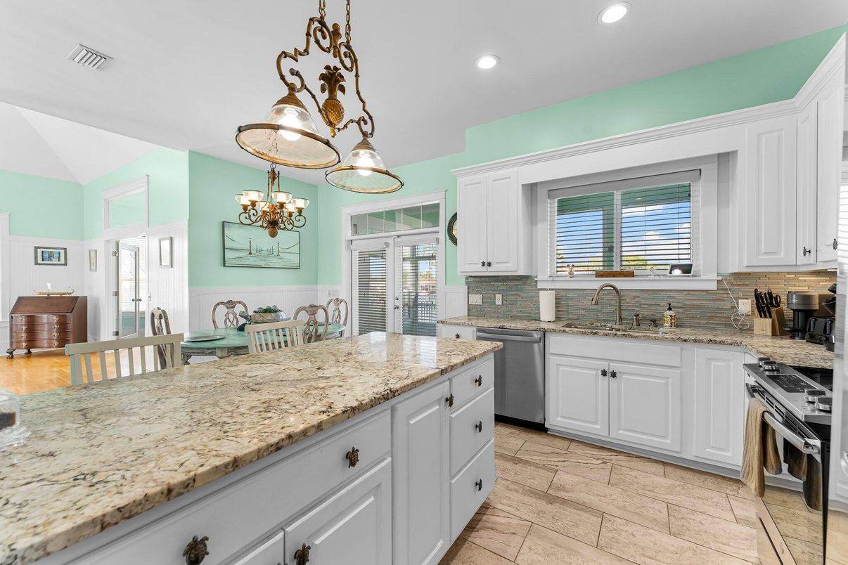Chandelier, Dining room, Interior, Kitchen, Recessed Lighting, Stainless Steel Appliances, Wood Texture Flooring