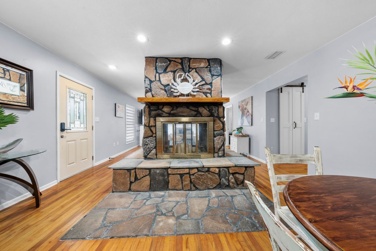 Fireplace, Interior, Recessed Lighting, Stone Walls, Wood Texture Flooring
