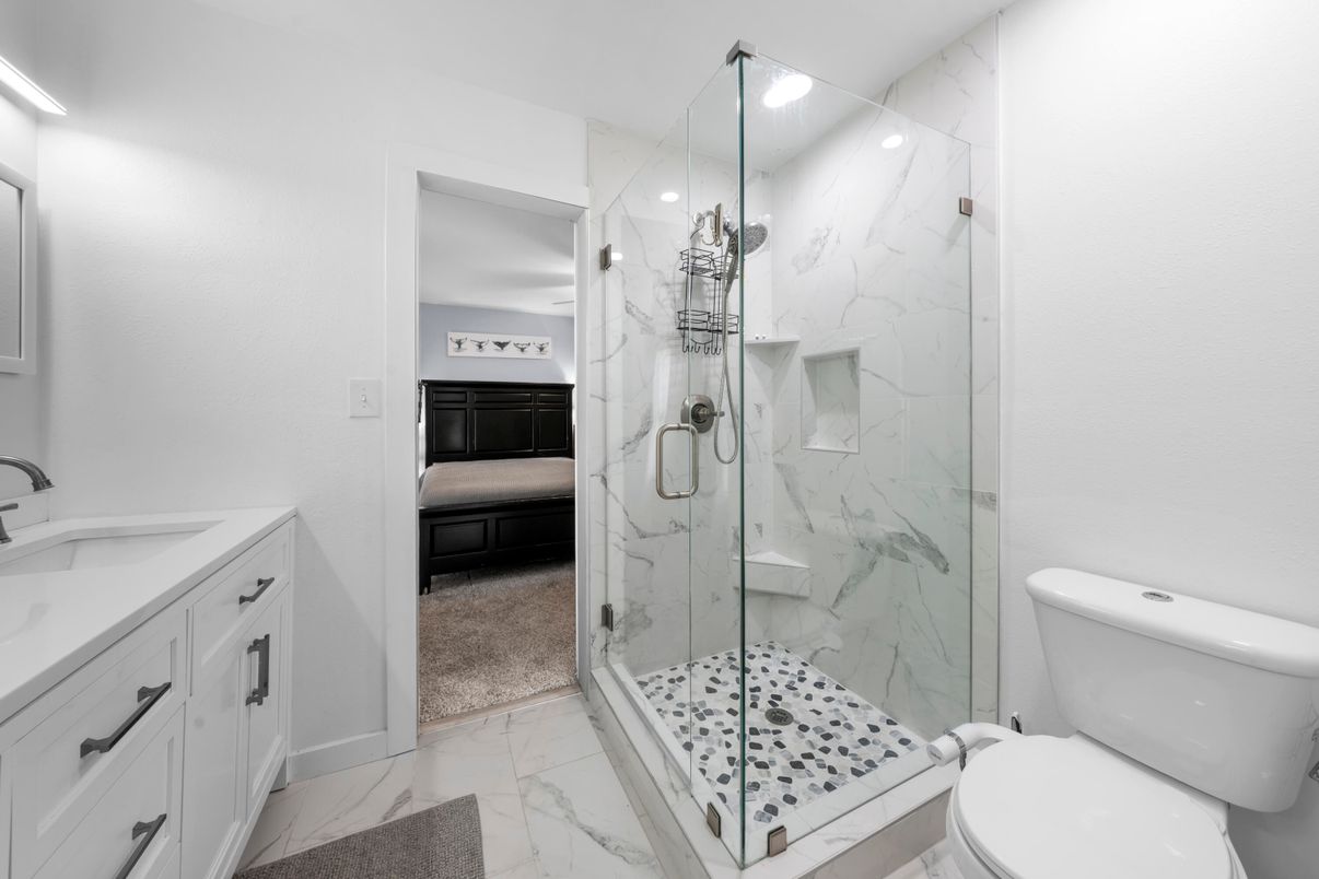 Bathroom, Dual Sink Vanities, Glass Shower, Interior, Marble, Marble Walls, Recessed Lighting