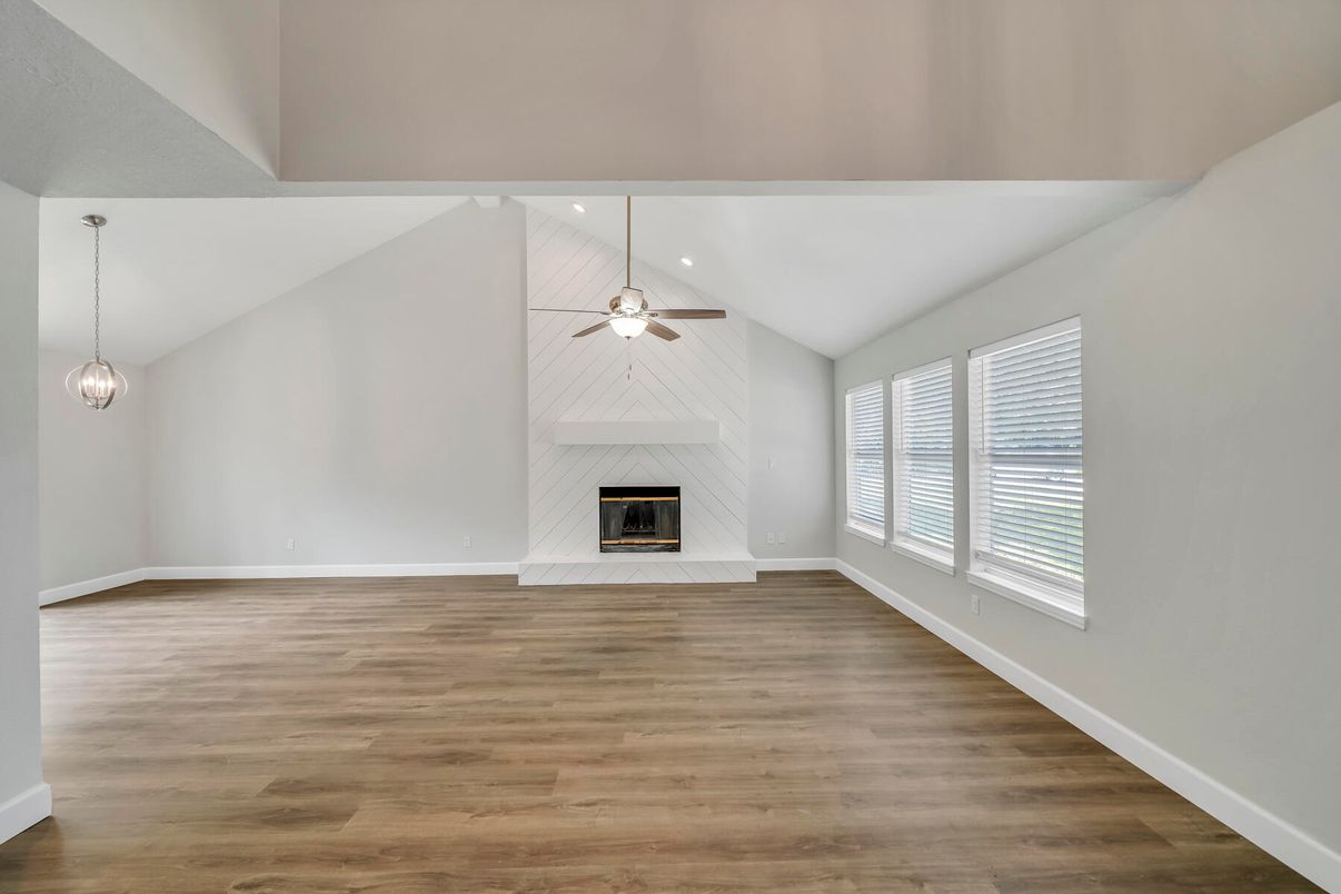Empty room, Fireplace, Interior, Pendant Lights, Recessed Lighting, Wood Texture Flooring