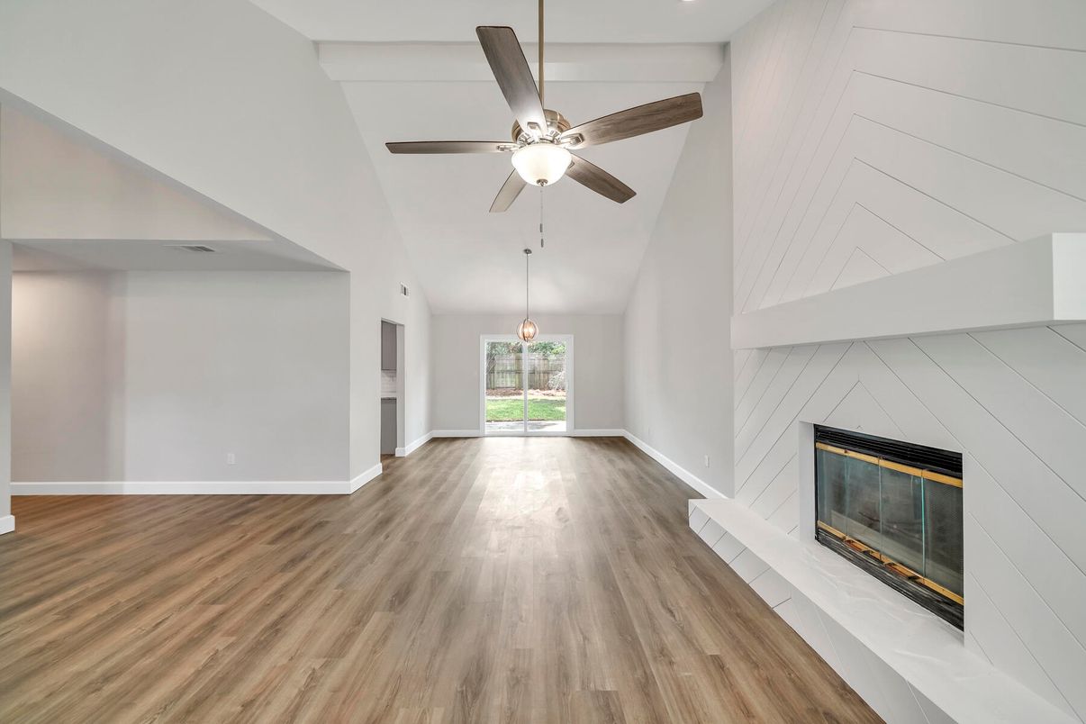 Empty room, Fireplace, Interior, Pendant Lights, Recessed Lighting, Wood Texture Flooring