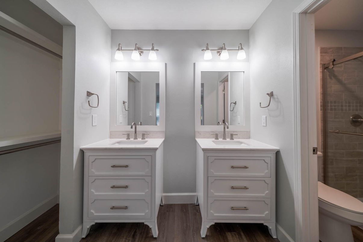Bathroom, Dual Sink Vanities, Glass Shower, Interior, Wood Texture Flooring