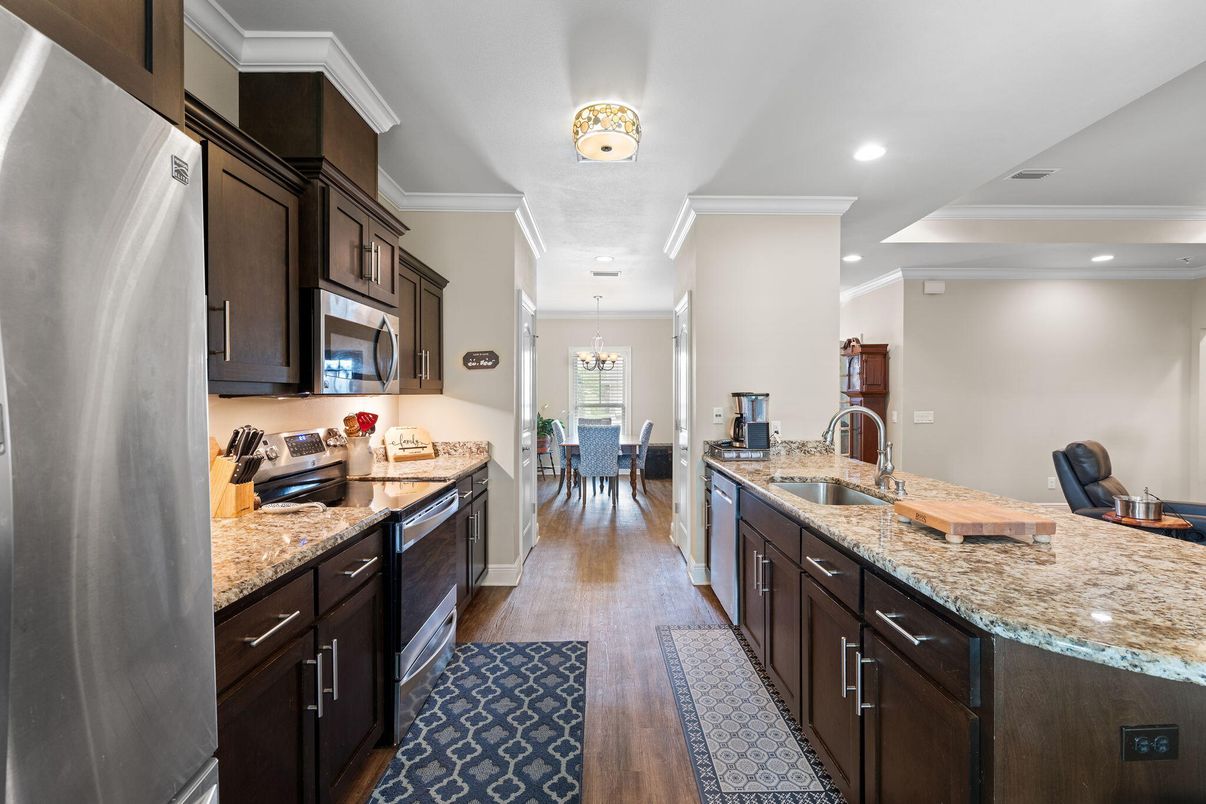 Dining room, Interior, Kitchen, Recessed Lighting, Stainless Steel Appliances, Wood Texture Flooring