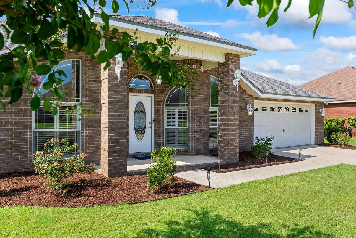 Attached, Exterior, Facade, Brick Facade, Spanish Mediterranean