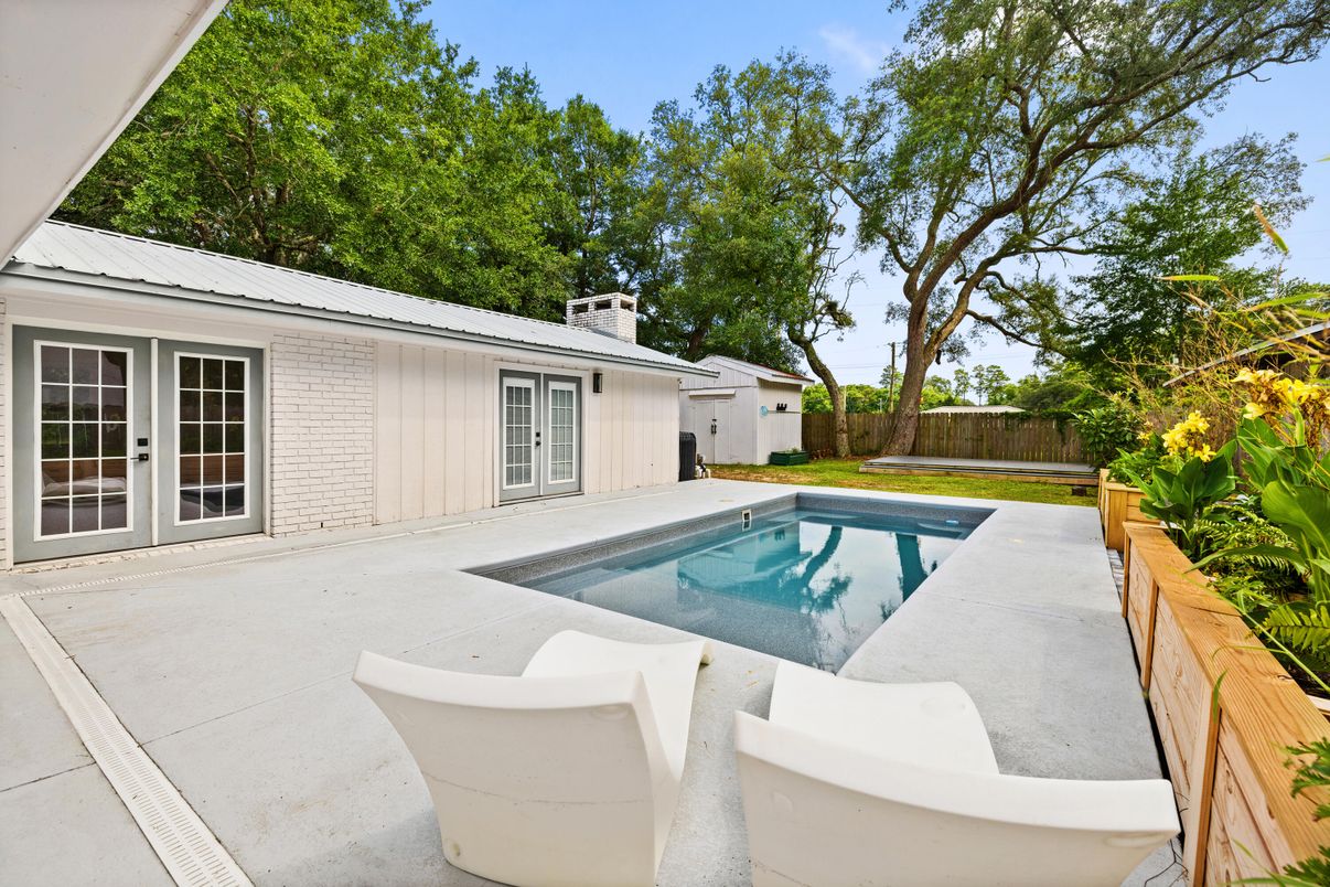 Exterior, Pool, Solar Panels