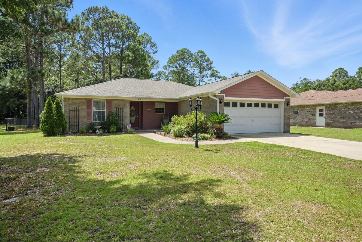 Attached, Backyard, Exterior, Facade, Brick Facade, Ranch