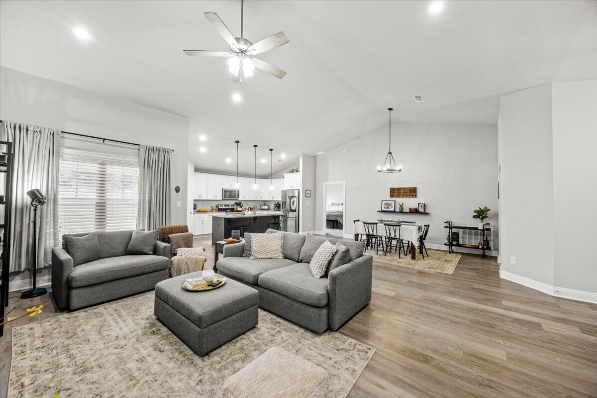 Dining room, Interior, Kitchen, Living room, Pendant Lights, Recessed Lighting, Stainless Steel Appliances, Wood Texture Flooring