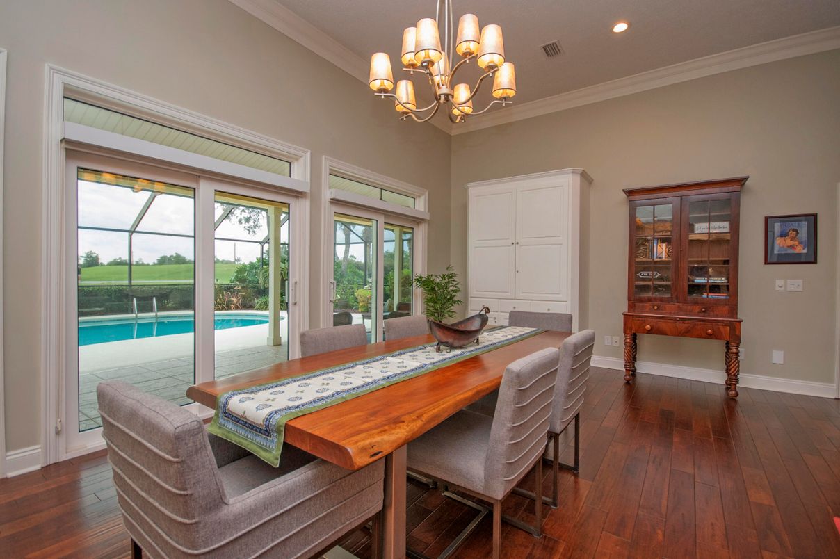 Chandelier, Dining room, Glass Ceilings, Interior, Pool, Recessed Lighting, Sun Room, Wood Texture Flooring