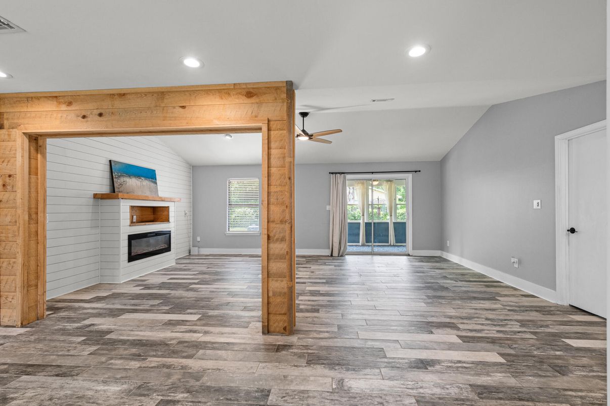 Empty room, Fireplace, Interior, Recessed Lighting, Wood Texture Flooring, Wooden Walls