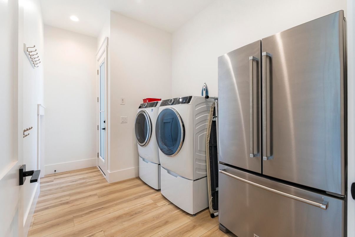 Interior, Recessed Lighting, Stainless Steel Appliances, Washer, Wood Texture Flooring