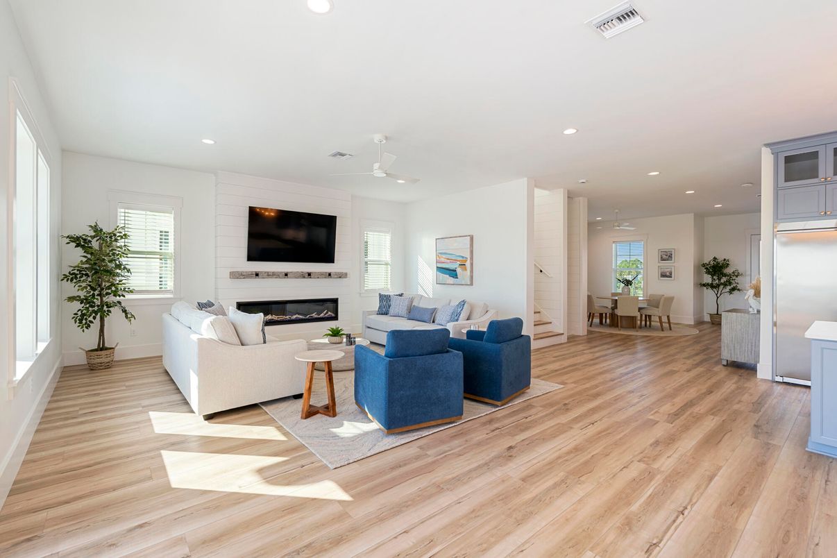 Dining room, Fireplace, Interior, Living room, Recessed Lighting, Wood Texture Flooring