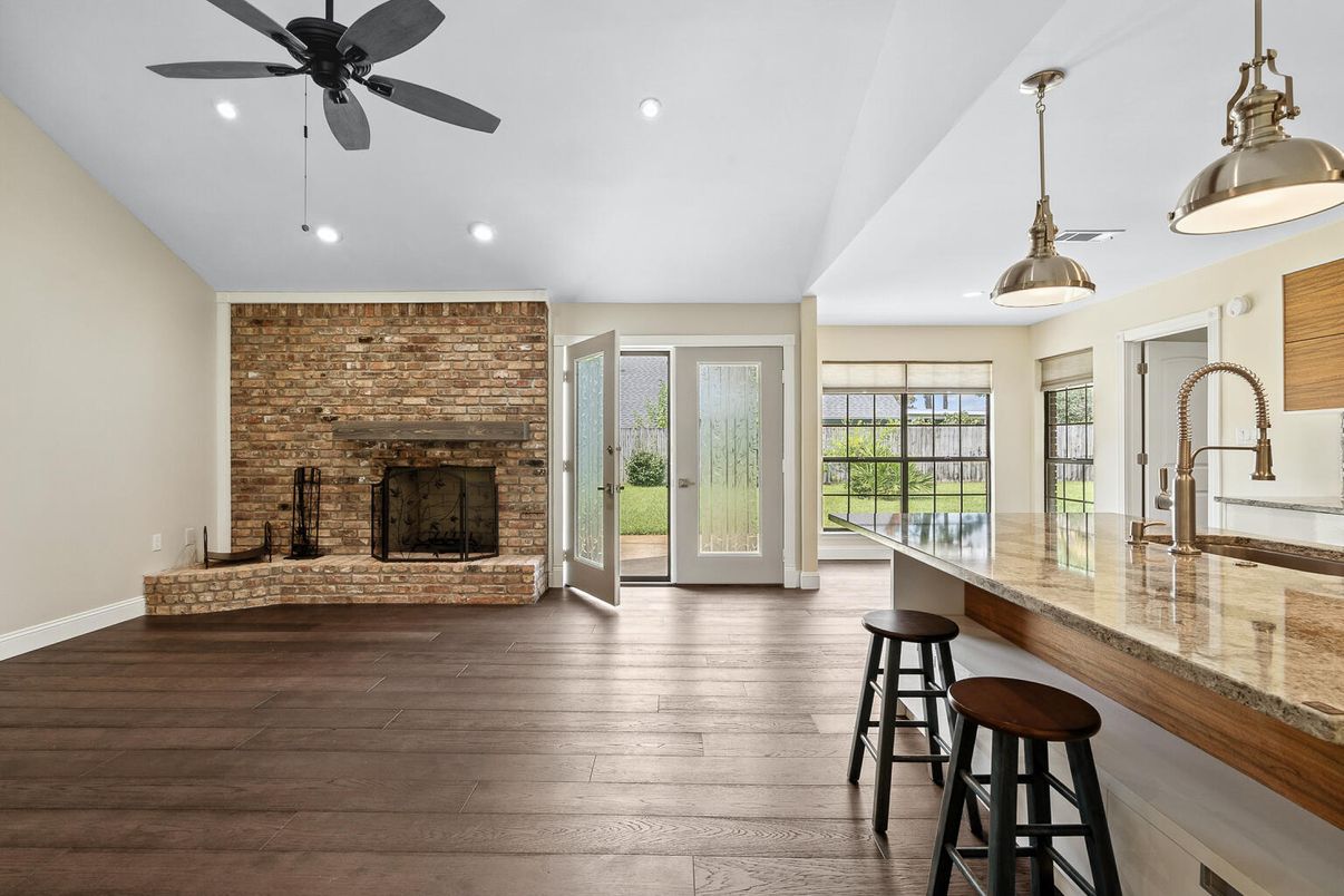 Fireplace, Interior, Pendant Lights, Recessed Lighting, Stone Walls, Wood Texture Flooring