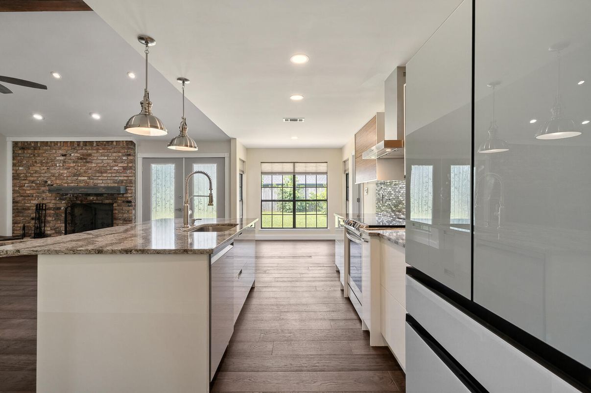 Fireplace, Interior, Kitchen, Pendant Lights, Recessed Lighting, Stone Walls, Wood Texture Flooring