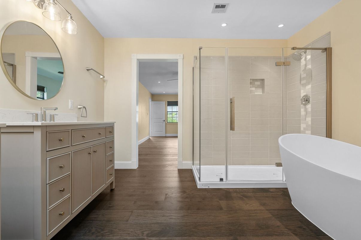 Bathroom, Free Standing Baths, Glass Shower, Interior, Recessed Lighting, Wood Texture Flooring