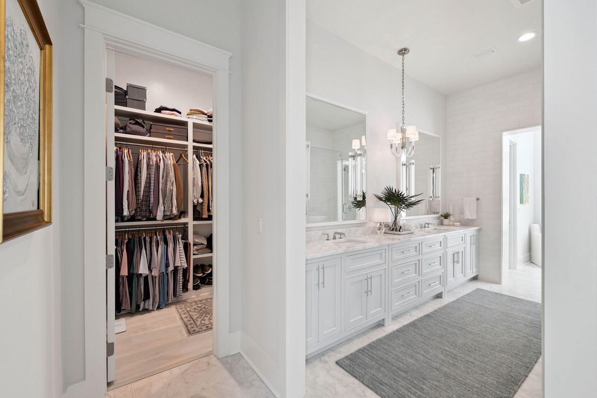 Bathroom, Dual Sink Vanities, Interior, Marble, Pendant Lights, Recessed Lighting, Walk-in Closets, Wood Texture Flooring