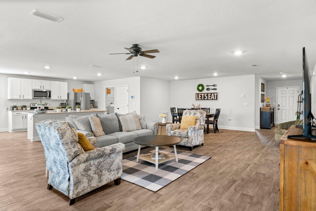 Dining room, Interior, Kitchen, Living room, Recessed Lighting, Stainless Steel Appliances, Wood Texture Flooring