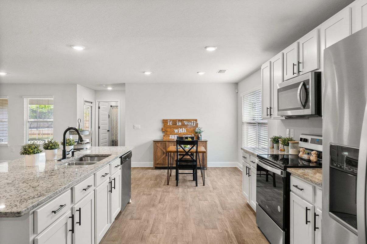 Dining room, Interior, Kitchen, Recessed Lighting, Stainless Steel Appliances, Wood Texture Flooring