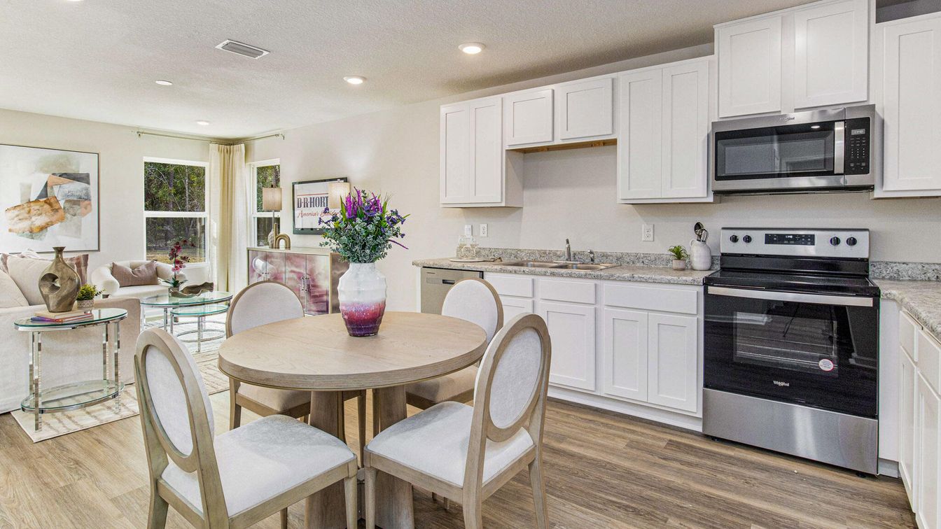Dining room, Interior, Kitchen, Recessed Lighting, Stainless Steel Appliances, Wood Texture Flooring