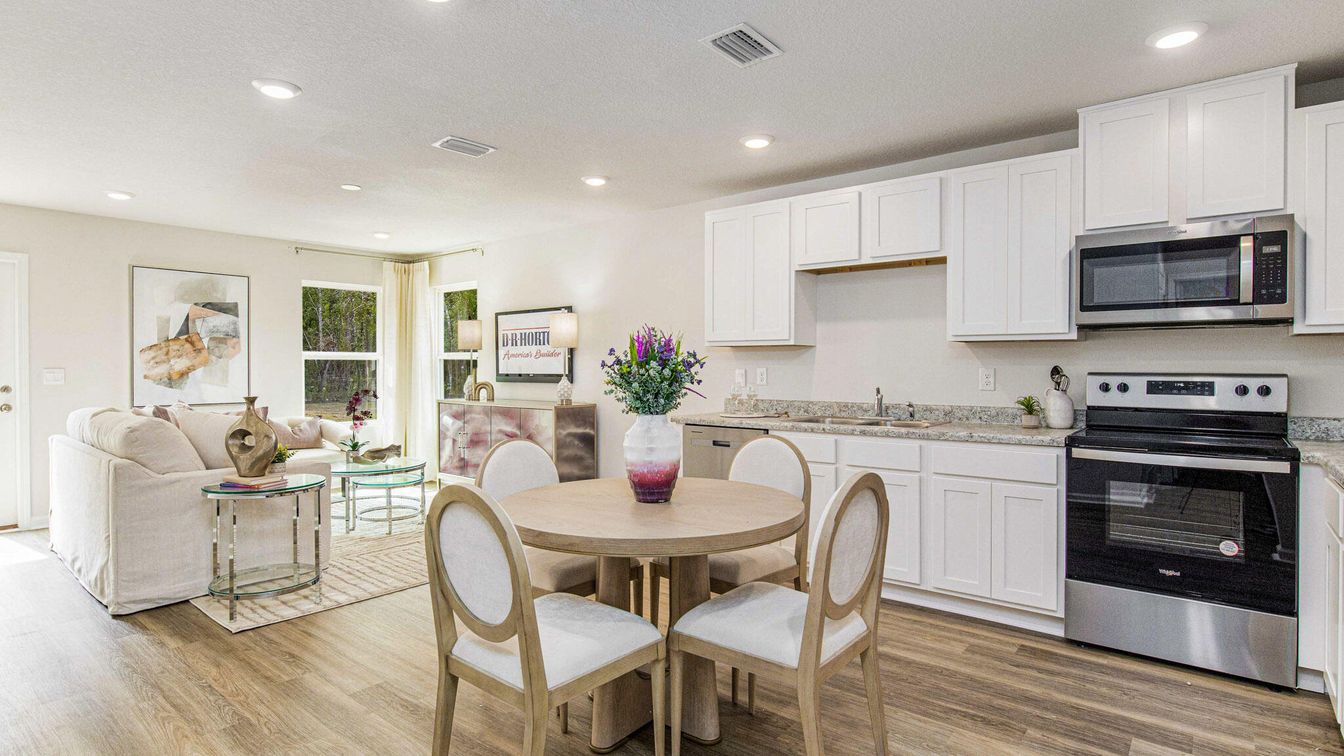 Dining room, Interior, Kitchen, Living room, Recessed Lighting, Stainless Steel Appliances, Wood Texture Flooring