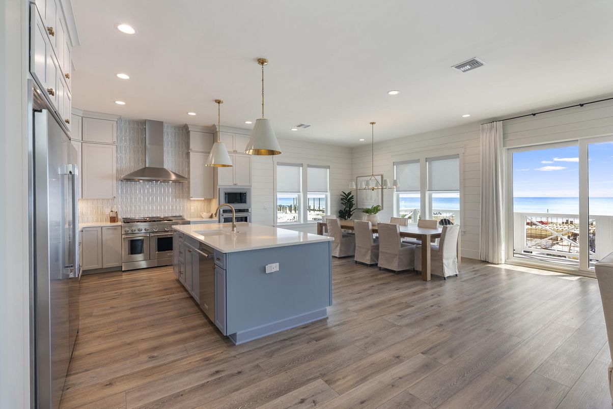 Dining room, Interior, Kitchen, Pendant Lights, Recessed Lighting, Stainless Steel Appliances, Water, Wood Texture Flooring