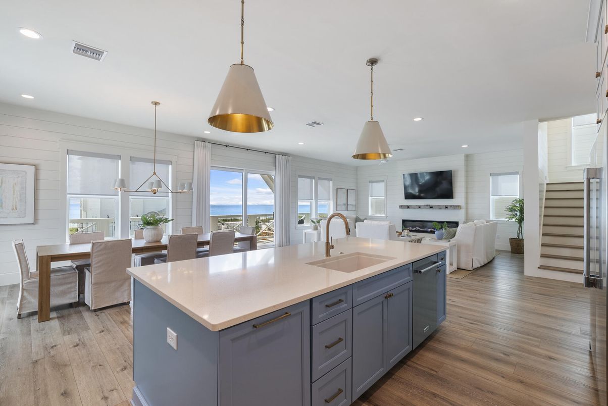 Dining room, Fireplace, Interior, Kitchen, Living room, Pendant Lights, Recessed Lighting, Water, Wood Texture Flooring