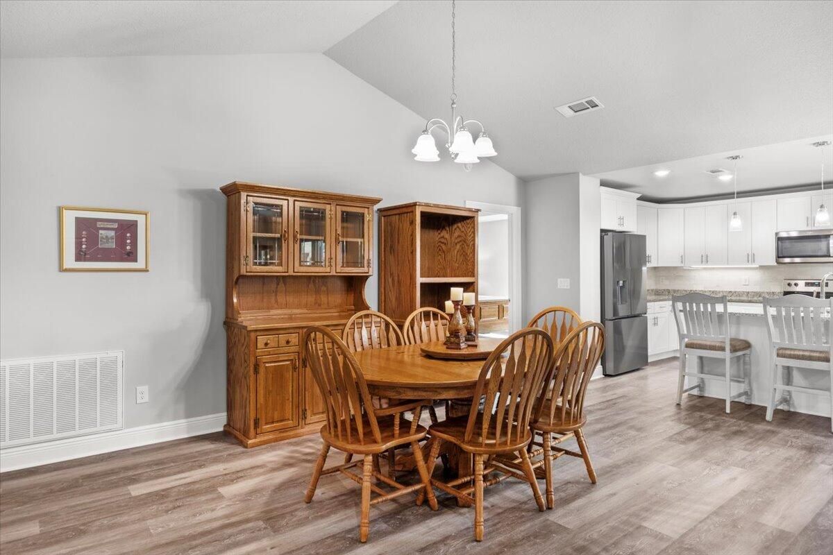 Dining room, Interior, Kitchen, Pendant Lights, Stainless Steel Appliances, Wood Texture Flooring