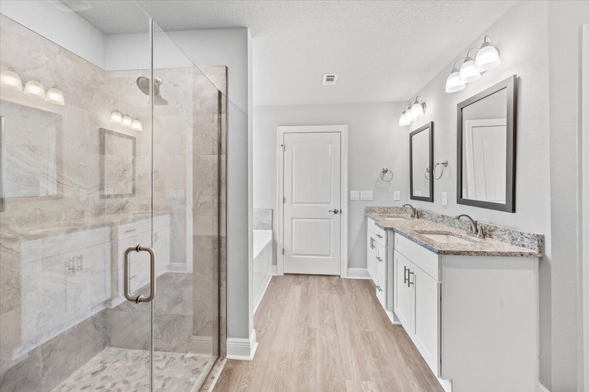 Bathroom, Dual Sink Vanities, Glass Shower, Interior, Wood Texture Flooring