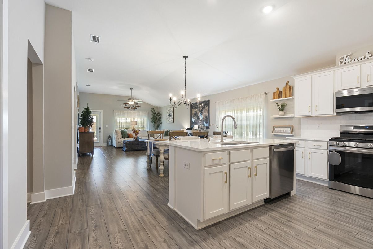 Chandelier, Dining room, Interior, Kitchen, Living room, Pendant Lights, Recessed Lighting, Stainless Steel Appliances, Wood Texture Flooring