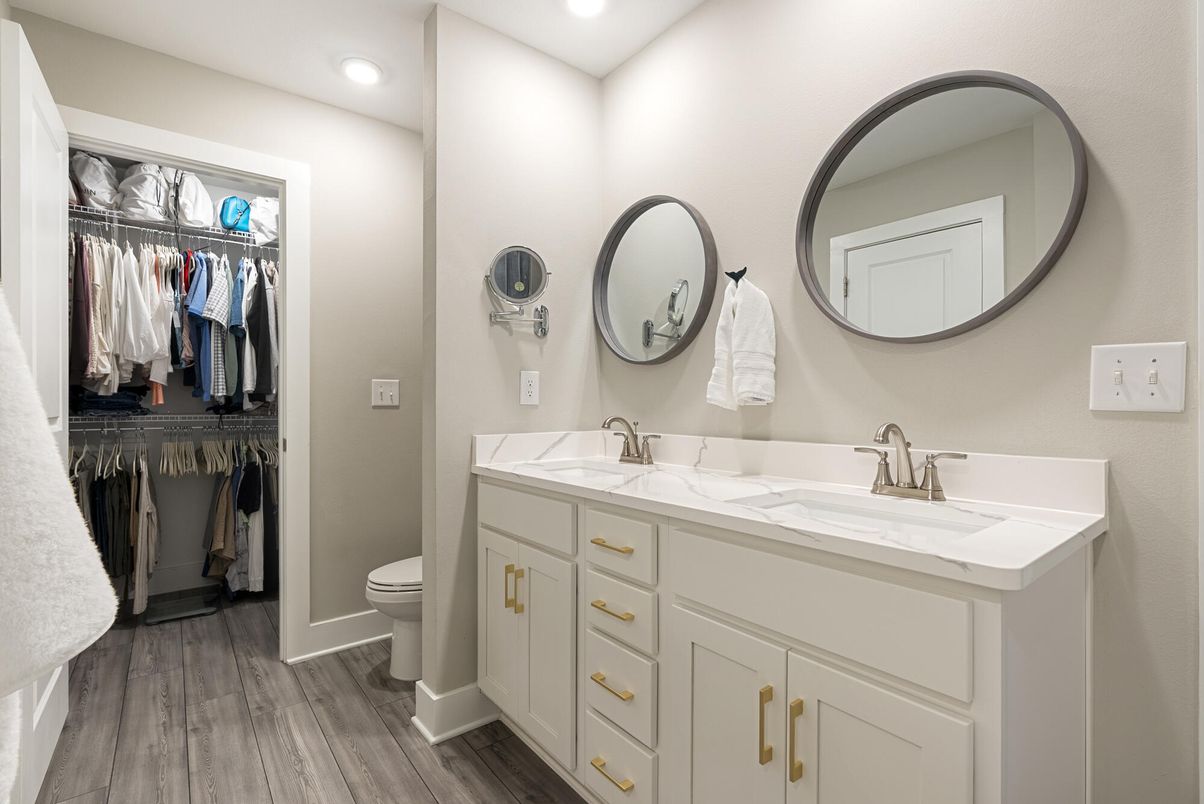 Bathroom, Dual Sink Vanities, Interior, Recessed Lighting, Walk-in Closets, Wood Texture Flooring