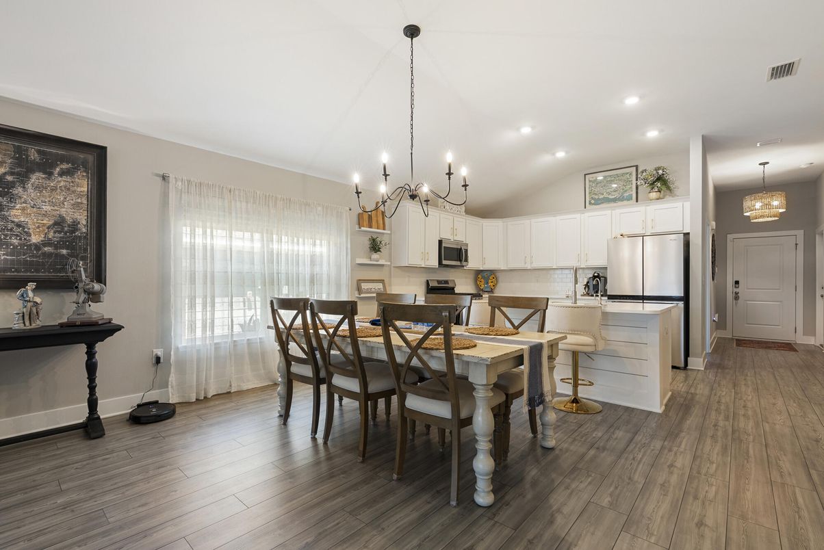 Chandelier, Dining room, Interior, Kitchen, Pendant Lights, Recessed Lighting, Stainless Steel Appliances, Wood Texture Flooring