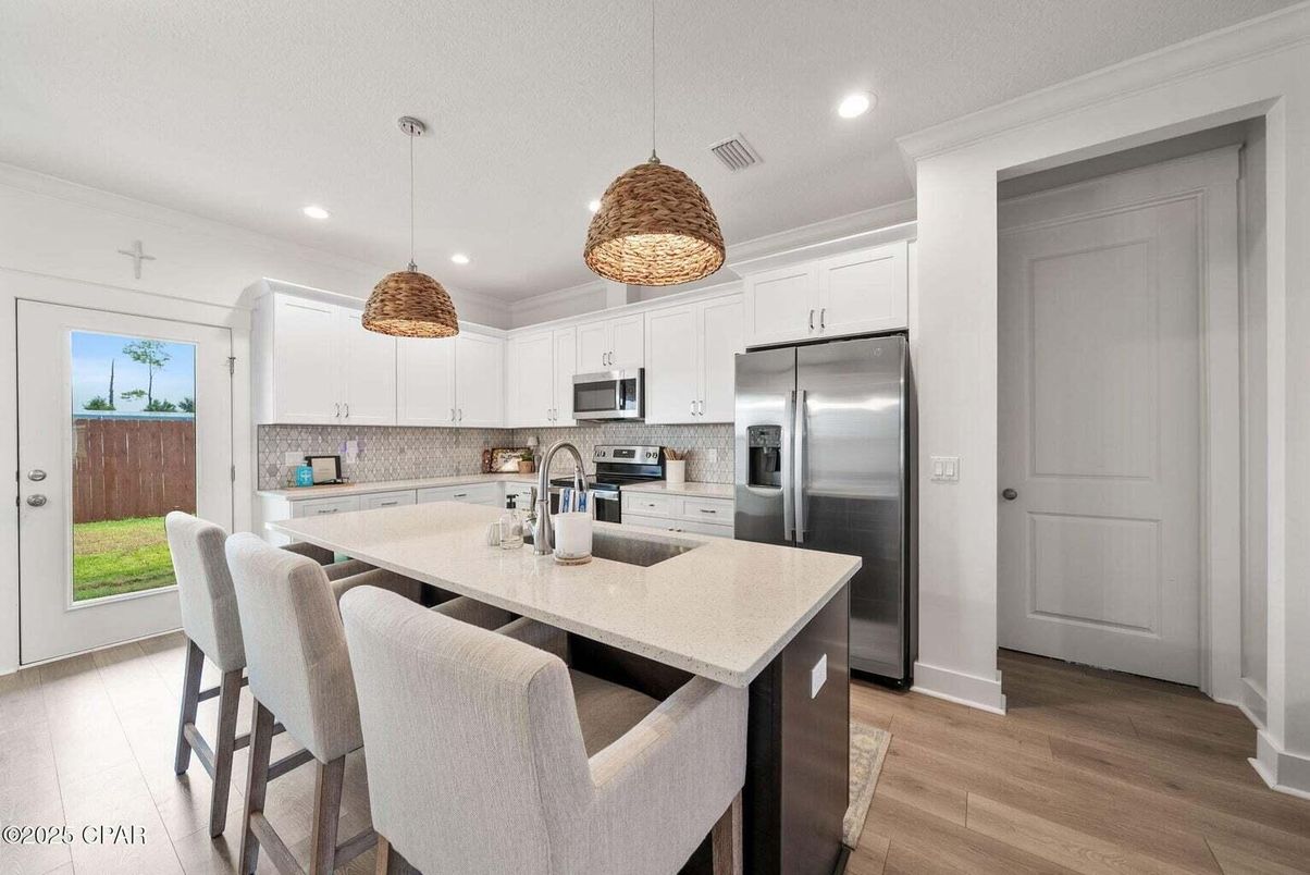 Interior, Kitchen, Pendant Lights, Recessed Lighting, Stainless Steel Appliances, Wood Texture Flooring