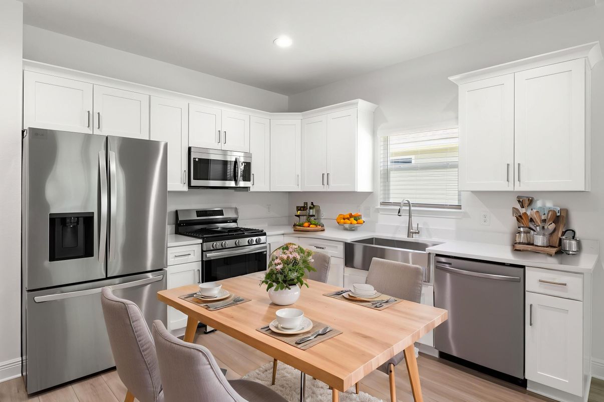 Dining room, Interior, Kitchen, Recessed Lighting, Stainless Steel Appliances, Wood Texture Flooring