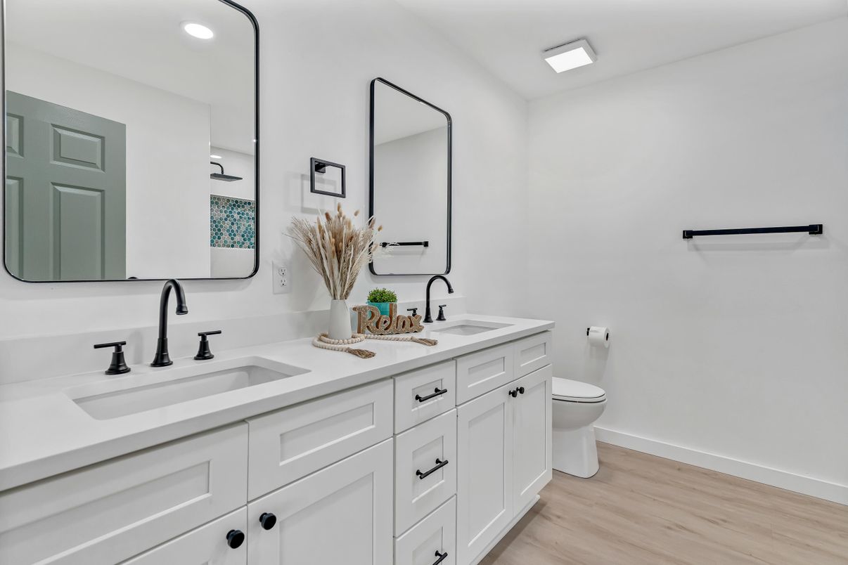 Bathroom, Dual Sink Vanities, Interior, Recessed Lighting, Wood Texture Flooring