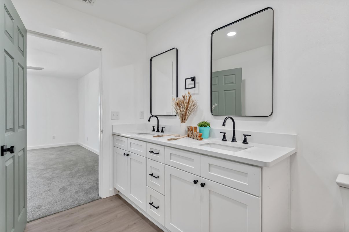 Bathroom, Dual Sink Vanities, Interior, Recessed Lighting, Wood Texture Flooring