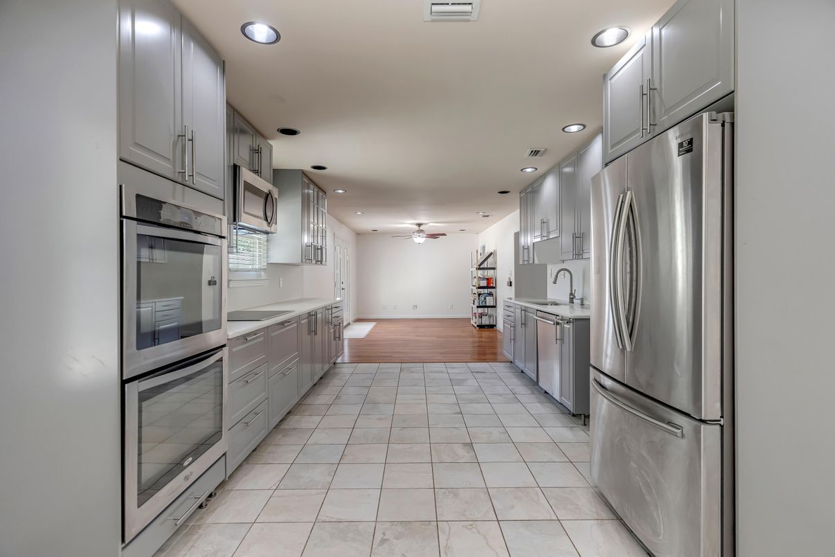 Interior, Kitchen, Recessed Lighting, Stainless Steel Appliances, Wood Texture Flooring