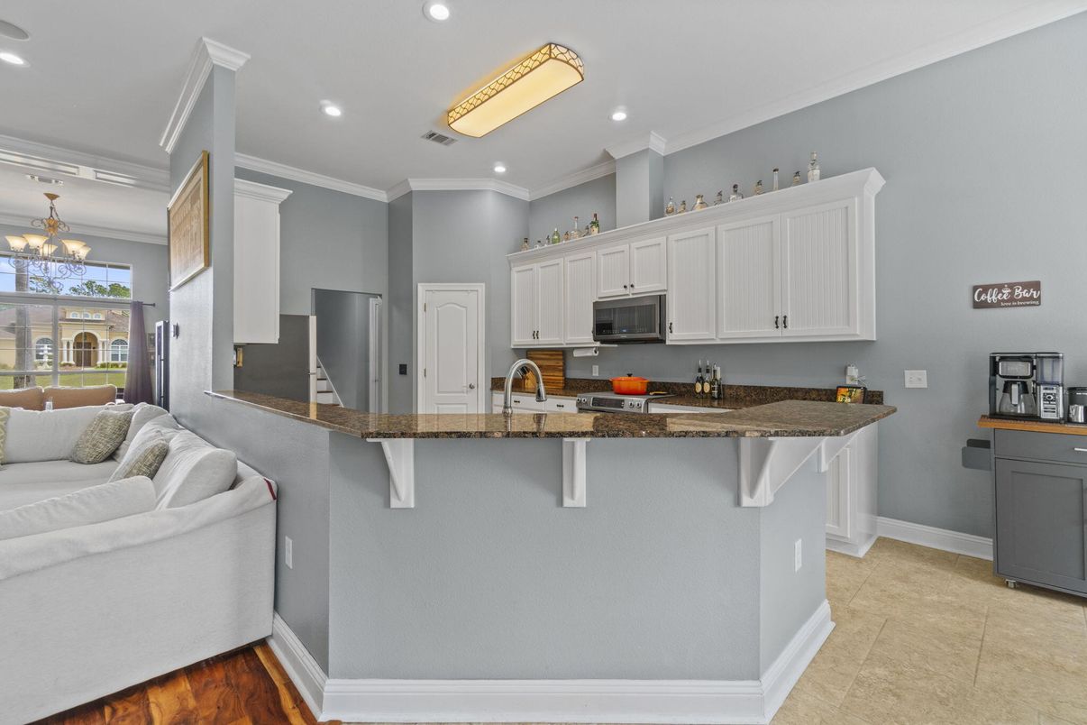 Chandelier, Interior, Kitchen, Recessed Lighting, Stainless Steel Appliances, Wood Texture Flooring