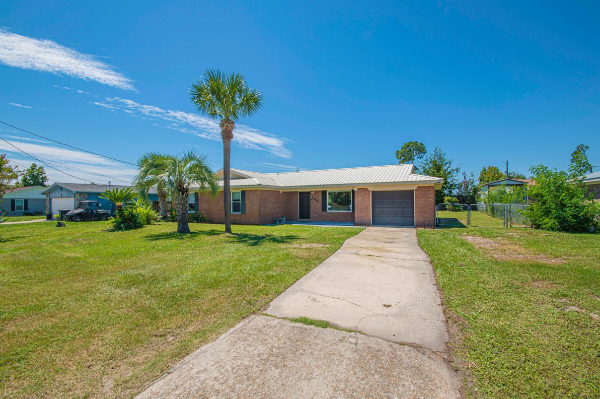 Attached, Backyard, Exterior, Facade, Brick Facade, Ranch