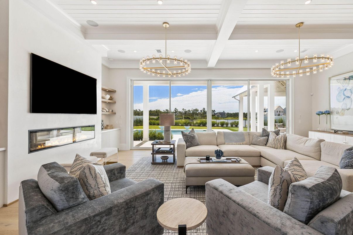Chandelier, Fireplace, Interior, Living room, Pendant Lights, Recessed Lighting, Wood Texture Flooring