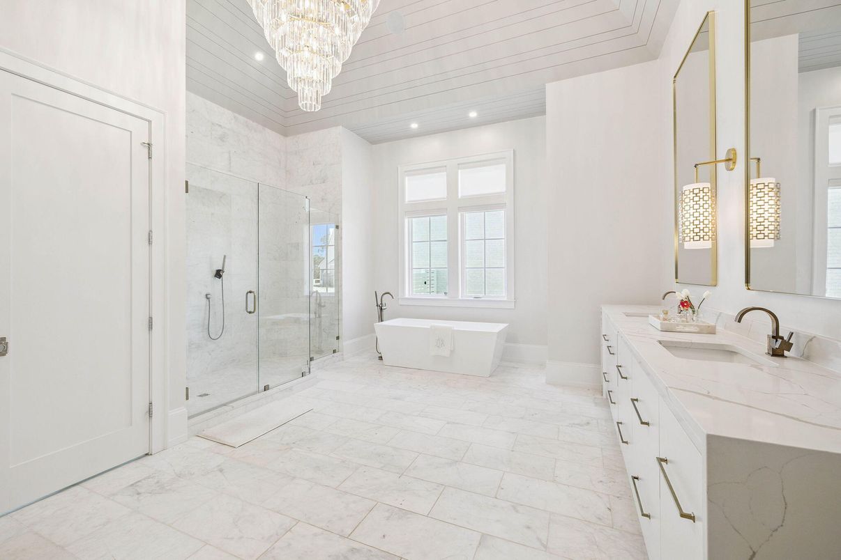Bathroom, Chandelier, Dual Sink Vanities, Free Standing Baths, Glass Shower, Interior, Marble, Marble Walls, Recessed Lighting